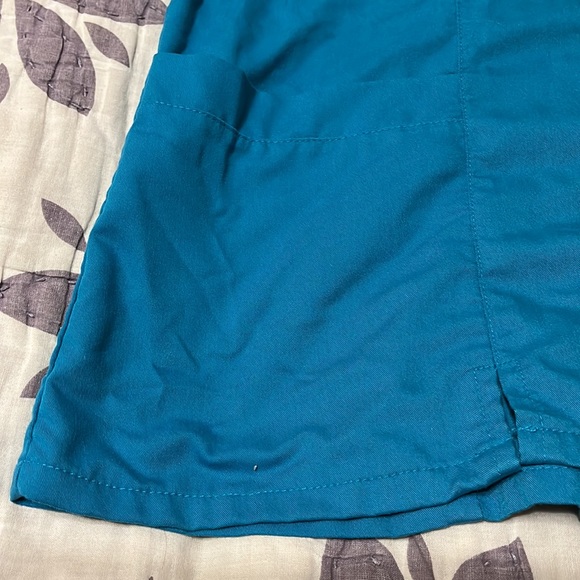 Grey’s Anatomy Two Pocket Mock Wrap Top (size Small, color Teal) - Picture 3 of 8
